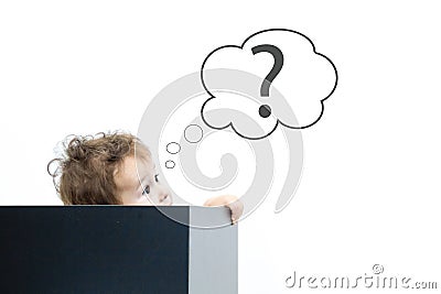 Concept for confusion, inspiration and solution. little boy looks out of the box, looking for the answer, the question mark, the Stock Photo