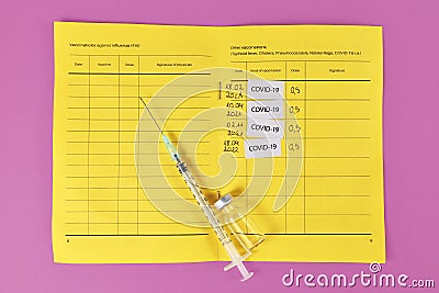 Concept for Corona virus booster vaccination showing vaccine passport with 4 entries Stock Photo