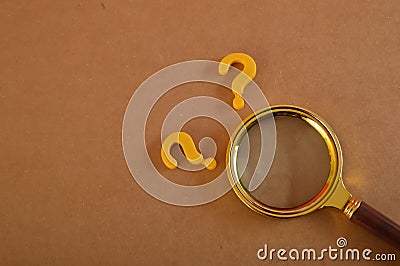 The concept of counseling for problems, solutions, and confusion is symbolized by a question mark on magnifying glass Stock Photo