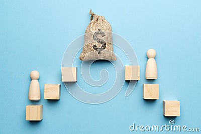 The concept of the cult of money. The bag with the image of a dollar and an abstract staircase with human figures Stock Photo