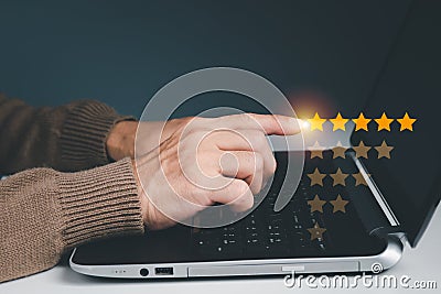 The concept is customer evaluation with five-star good rating feedback. clients satisfaction and positive review experience with Stock Photo