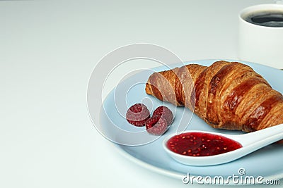 Concept of delicious food with croissant with raspberry jam on white background Stock Photo