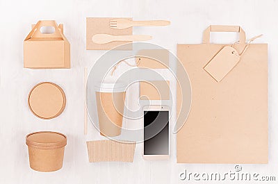 Concept design disposable brown paper pack for go food for restaurant, cafe, shop, advertising - bag, coffee cup, box for soup. Stock Photo