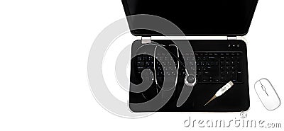 Concept: diagnostics, laptop and computer repair. A silver stethoscope lying on a black laptop, next to it is a thermometer that Stock Photo