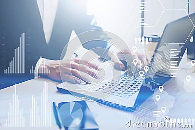 Concept of digital diagram,graph interfaces,virtual screen,connections icon.Businessman working at office on laptop at Stock Photo