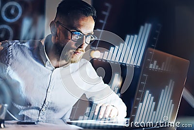 Concept of digital diagram,graph interfaces,virtual screen,connections icon.Young entrepreneur working at modern office Stock Photo