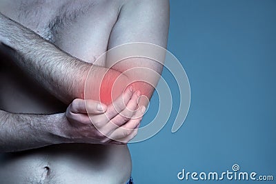 Concept disease. Pain in elbow joint Stock Photo
