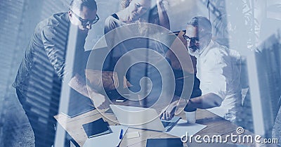 Concept of double exposure.Young business team making great discussion in modern coworking loft.Bearded businessman Stock Photo