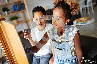 Concept of early childhood education, painting, talent, happy kids Stock Photo