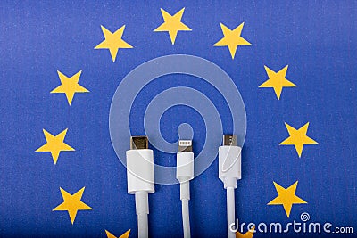 Concept for EU law to force USB-C chargers for all phones. EUROPEAN UNION flag and USBC universal Stock Photo