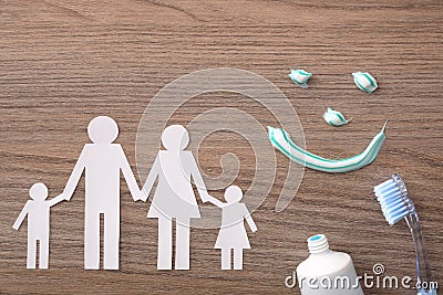 Concept of family dental insurance with representative elements on wood Stock Photo