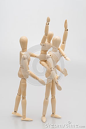 concept of family by man Wood Figure ,women Wood Figure and child wood figure ./white background Stock Photo