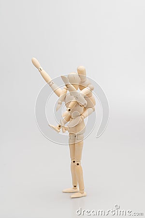concept of family by man Wood Figure ,women Wood Figure and child wood figure ./white background Stock Photo