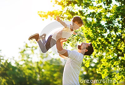 Concept of father`s day! happy family dad and child daughter in nature Stock Photo