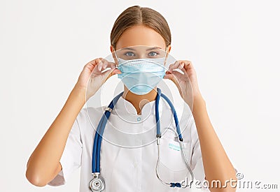 Concept of fighting and prevention coronavirus infection covid 19. a doctor put on protective medical mask Stock Photo