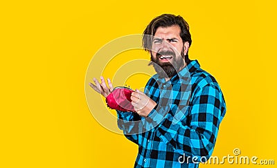 concept of finance and economy. unhappy man hold purse. poor man need some money. loan in crises. have money saving Stock Photo