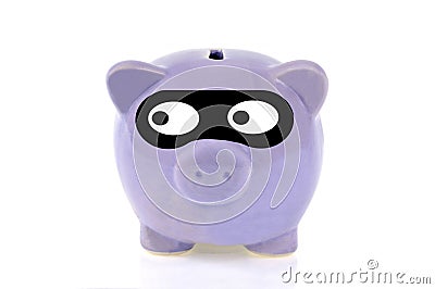 Piggy bank with a thief mask on a white background Stock Photo
