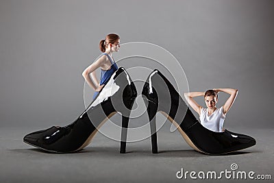 Concept of girl in black and stilleto high heels Stock Photo