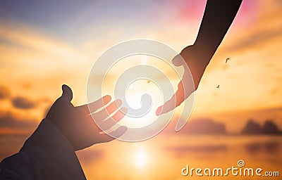 The concept of God`s salvation:silhouette of helping hand concept and international day of peace Stock Photo
