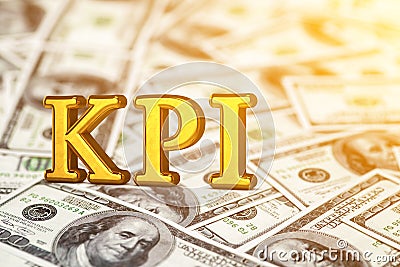 Concept gold abbreviation of KPI - Key Perfomance Indicator standing or lying on banknotes background. 3D Render. Stock Photo