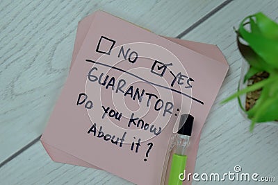 Concept of Guarantor, Do you know about it? Yes write on sticky notes isolated on Wooden Table Stock Photo