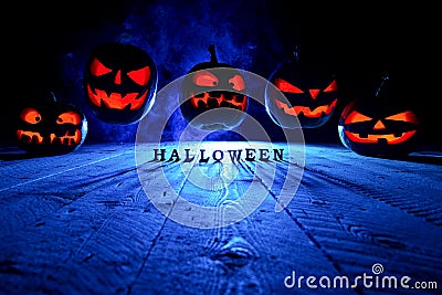 The concept of Halloween. Many Evil scary pumpkins flying in the Stock Photo