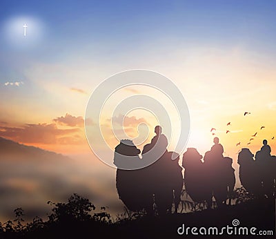 Christmas Eve concept: three doctors ride camels to Bethlehem Stock Photo
