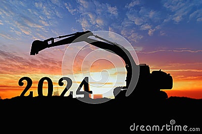 Concept happy new year 2024,crawler excavator silhouette Stock Photo