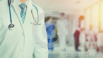 Concept of health care and medicine. Confident professional doctor in white coat with stethoscope, portrait, unrecognizable person Stock Photo