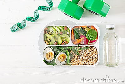 Concept healthy food and sports lifestyle. Vegetarian lunch. Healthy breakfast. Proper nutrition. Lunchbox. Top view. Flat lay Stock Photo