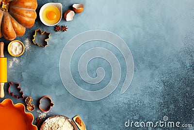Concept homemade fall baking with pumpkin, food ingredients, spices and kitchen utencil Stock Photo