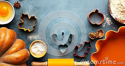 Concept homemade fall baking with pumpkin, food ingredients, spices and kitchen utencil. Cooking pumpkin pie and cookies for Stock Photo