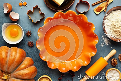 Concept homemade fall baking with pumpkin, food ingredients, spices and kitchen utencil. Cooking pumpkin pie and cookies for Stock Photo