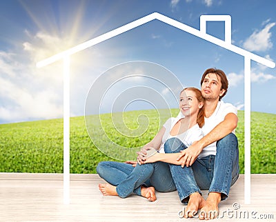 Concept: housing and mortgage for young families. couple dreaming of home Stock Photo