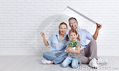 Concept housing young family. Mother father and child in new h Stock Photo