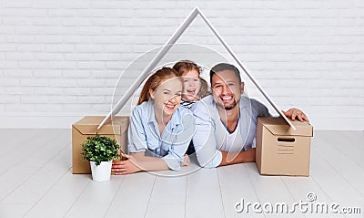 Concept housing young family. Mother father and child in new h Stock Photo