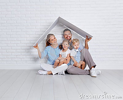 Concept housing a young family. mother father and children in n Stock Photo