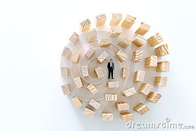 Concept image of businessman trapped in puzzle maze Stock Photo