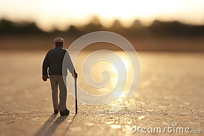 Concept image of senior person figure looking at the sunset Stock Photo