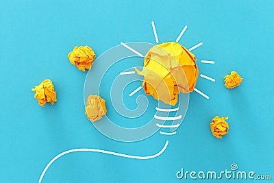 Concept image of successful idea, crumpled paper and light bulb sketch, brainstorming and creative thinking Stock Photo