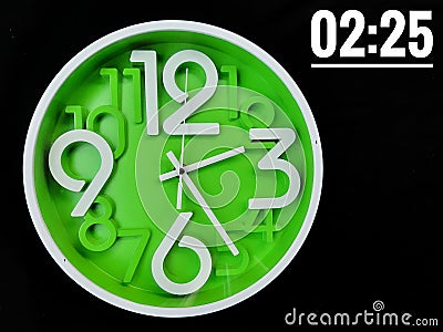 Concept image with word 2:25. Clock on black background.Time is 02:25 am or pm. Two o'clock pass twenty five minute am or pm. Stock Photo