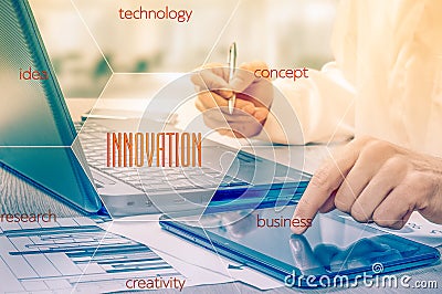 The concept of innovation in business. Businessman working with laptop and tablet. Growth statistics. Increase profits Stock Photo