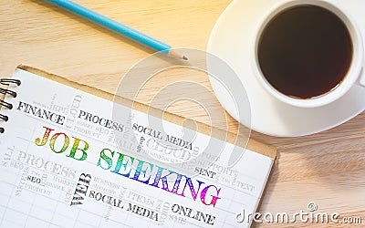 Concept JOB SEEKING message on book. Stock Photo