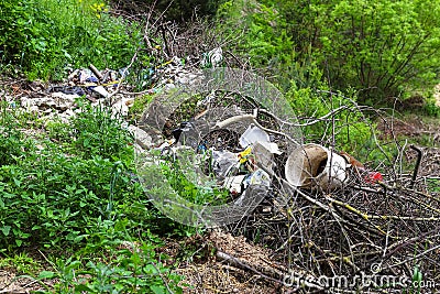 The concept of landfills piles of garbage landfills in nature barbaric attitude to the environment. Stock Photo