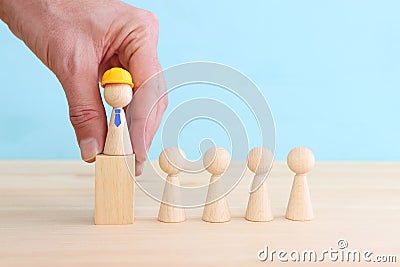 Concept of leadership and forwarding ahead. group of figures and manager Stock Photo