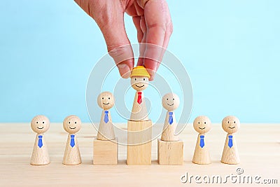 Concept of leadership and forwarding ahead. group of figures and manager Stock Photo