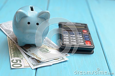 The concept of lending. Money, calculator, piggy bank. Stock Photo