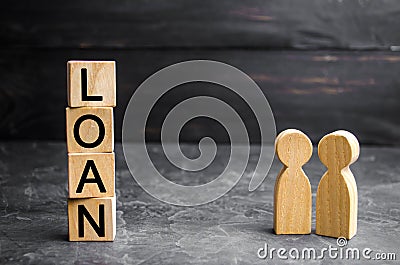 The concept of `Loan`. Businessmen are discussing questions about the company`s loans. The financial loans between the lender and Stock Photo