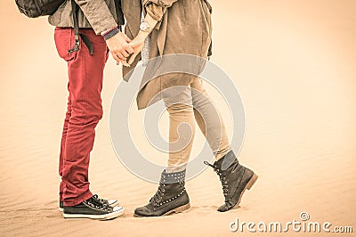 Concept of love in autumn - Couple of young lovers kissing Stock Photo