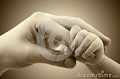 Concept of love and family. hands of mother and baby Stock Photo